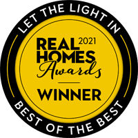 Real Homes 2021 Awards winner badge for best of the best glazing specialists, recognising IDSystems' award-winning doors and glazing systems.